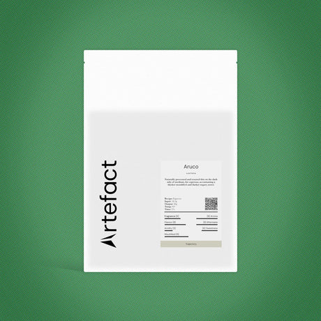 White product packaging with 'Artefact' branding on a green background