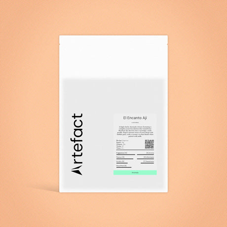 White product packaging with black text on a peach background