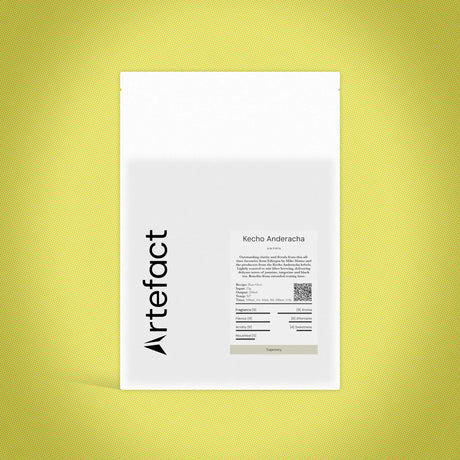 White product packaging with black text and 'Artefact' logo on a yellow textured background