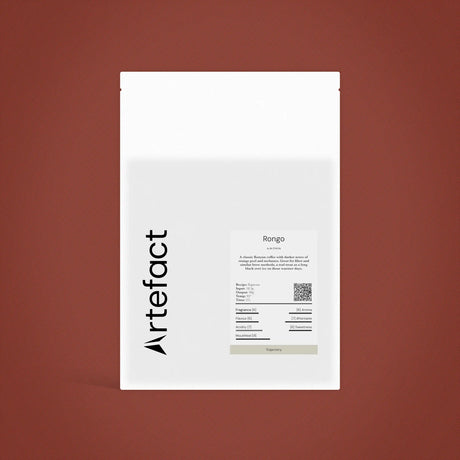 White coffee package with 'Artefact' branding on a brown background