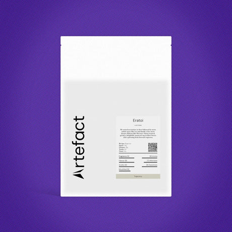 White product packaging with 'Artefact' branding on a purple background